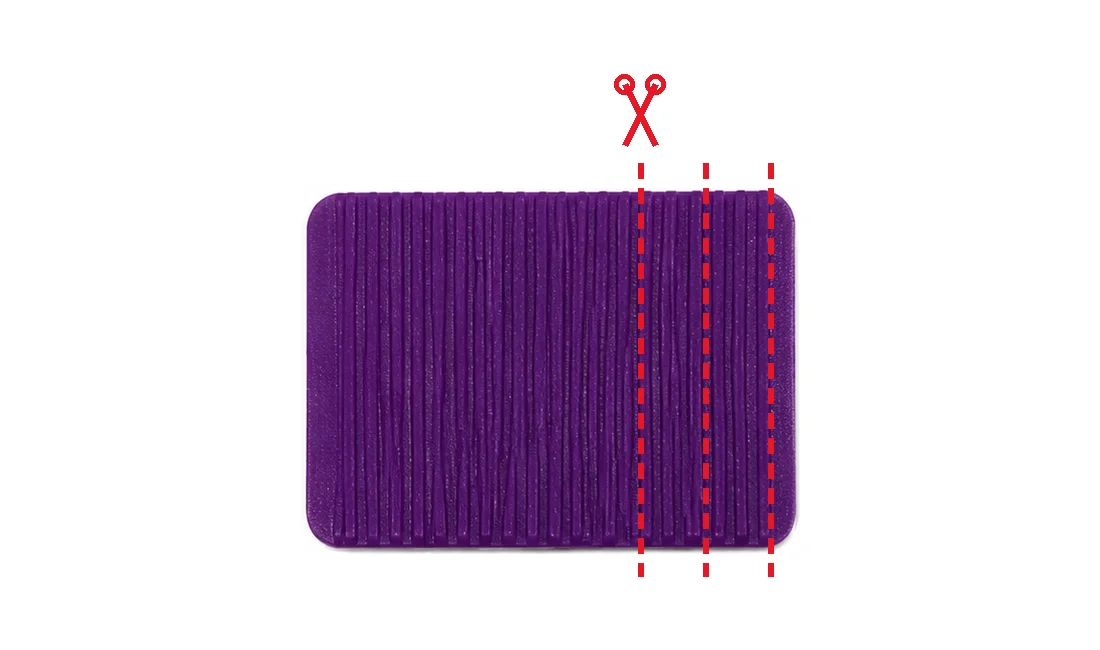 The band with dashed lines showing where to trim, a small section at a time